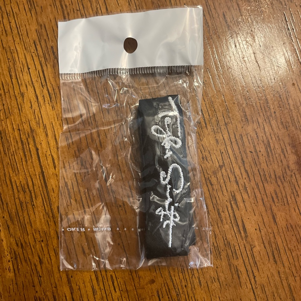 Taylor Swift black leather tie bracelet